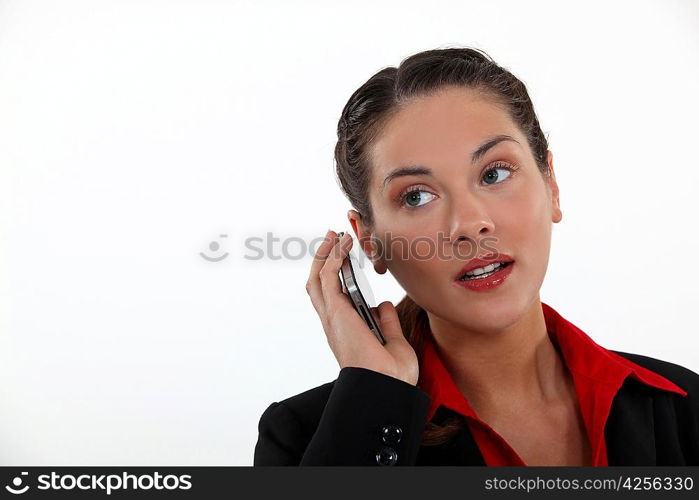 woman with cell phone straining her ears