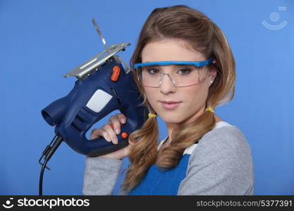 Woman with chain saw