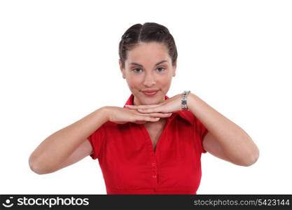 Woman with chin on her hands