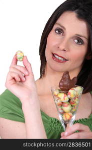 Woman with chocolate Easter eggs