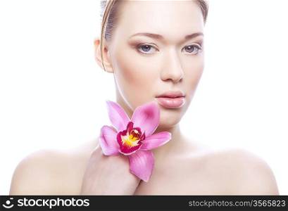 woman with clean skin and flower on white background