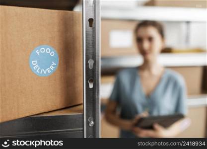 woman with clipboard warehouse