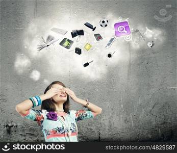 Woman with closed eyes. Young pretty woman hiding eyes with hands