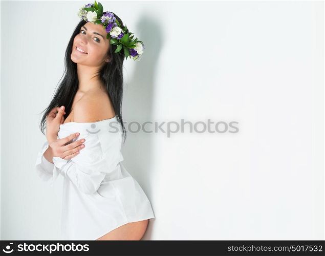 Woman with Colorful Wreath of Flowers. Valentine's Day