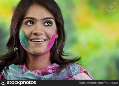 Woman with colour on her face