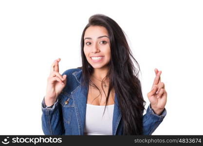 Woman with crossed fingers, isolated over a white background