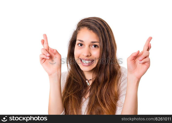 Woman with crossed fingers, isolated over a white background