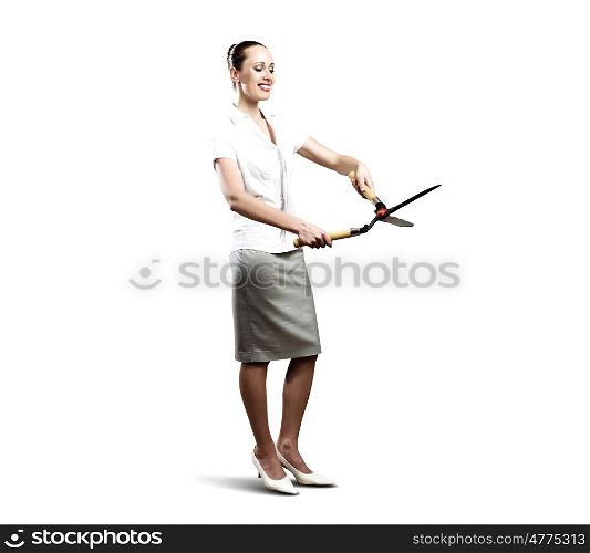 Woman with cutter. Young businesswoman on white background holding grass cutter