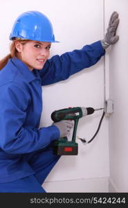 Woman with drill