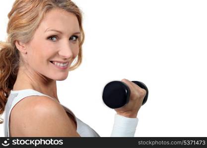 Woman with dumbbell