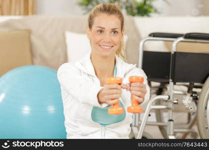 woman with dumbbells in hands fitness sport