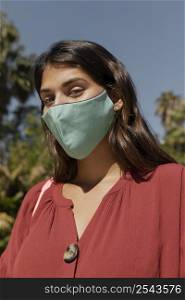 woman with face mask outdoors