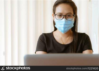 woman with face mask protection while working, Coronavirus, air pollution, allergy sick woman with medical mask