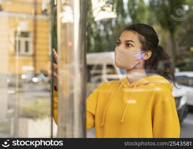 woman with face mask social distance concept