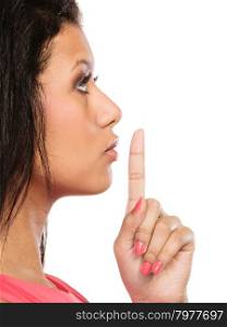 Woman with finger on lips showing silence gesture.. Young mixed race woman girl with finger on lips showing hand quiet silence sign gesture isolated on white. Profile side view.