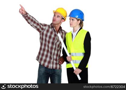 Woman with flat top, pointing to operator