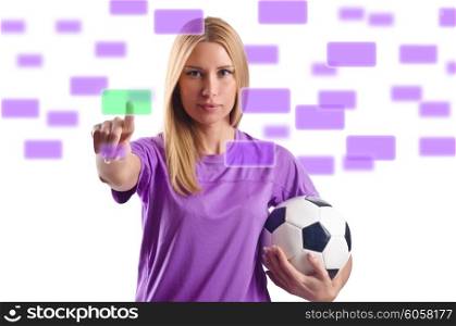 Woman with football pressing virtual buttons