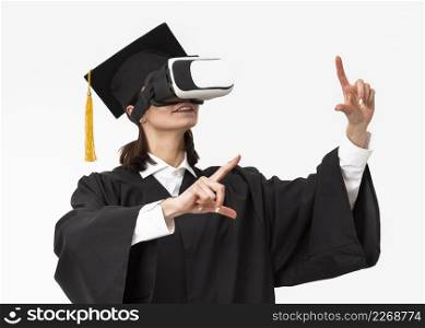 woman with graduation robe cap wearing virtual reality headset_3. woman with graduation robe cap wearing virtual reality headset_2