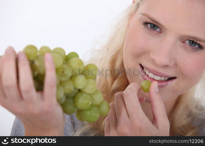 Woman with grapes