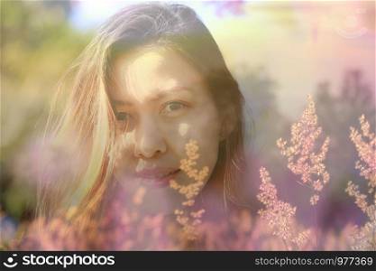 Woman with grass and sunset light Double Exposure