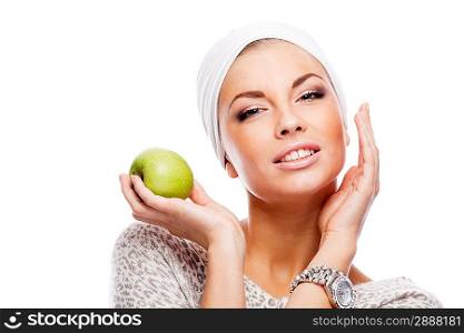 Woman with green apple. Isolated over white.