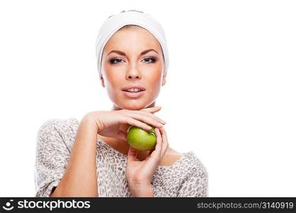 Woman with green apple. Isolated over white.