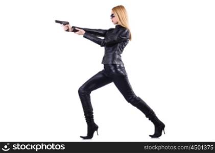 Woman with gun in black leather costume