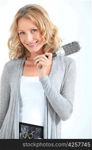 woman with hair brush