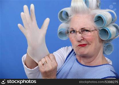 Woman with hair curlers