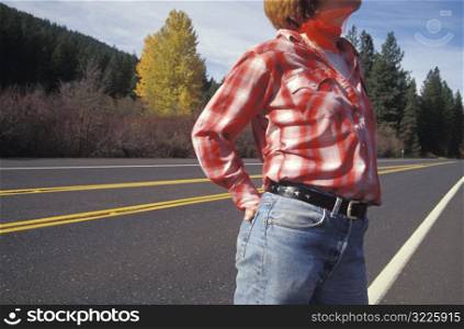 Woman With Hands in Hip Pockets