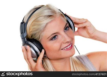 woman with headphones listening to music for relaxation