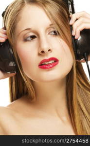 woman with headphones listening to music. portrait of a woman with headphones listening to music