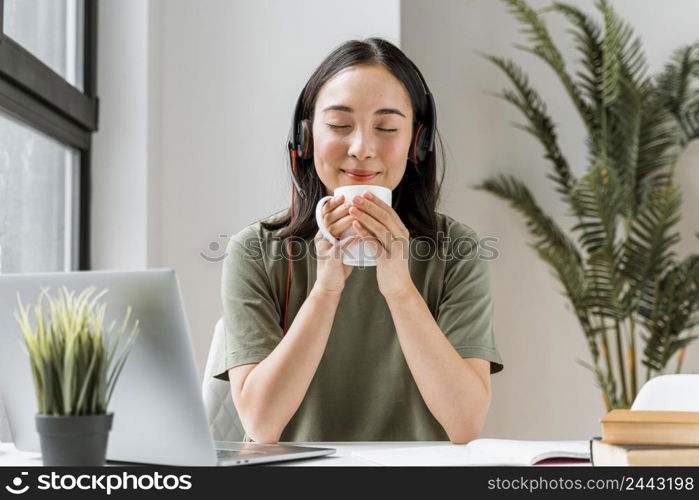 woman with headset having video call laptop 5