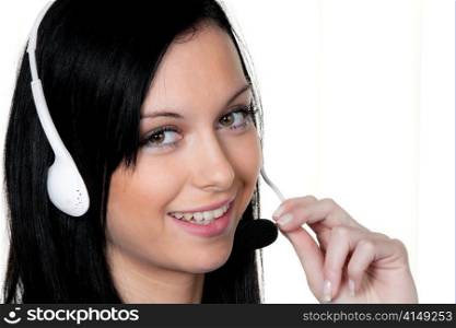 woman with headset in customer service. telephone hotline