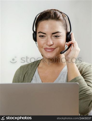 woman with headset using laptop 2