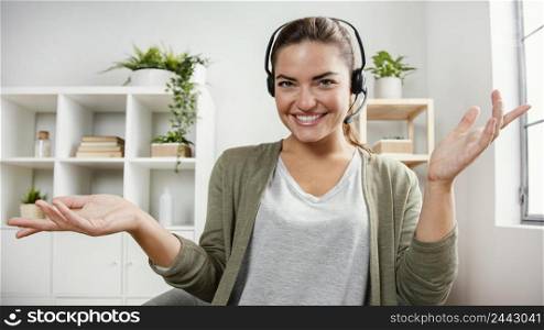 woman with headset using laptop