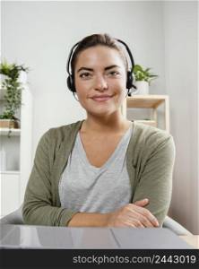 woman with headset using laptop 3
