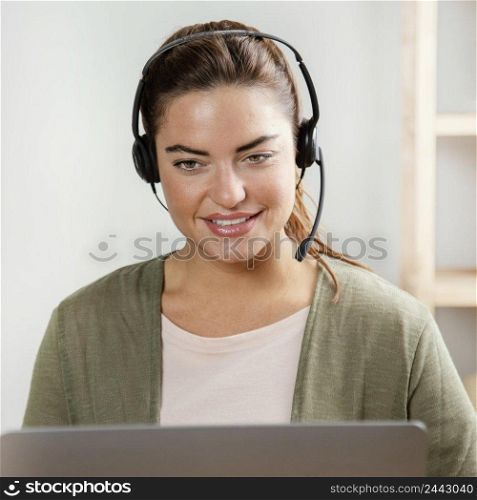 woman with headset using laptop 4