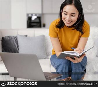 woman with headset video call laptop 3