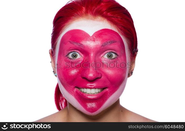 Woman with heart face painting isolated on white