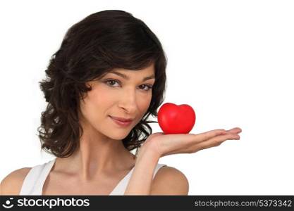 Woman with heart in hand