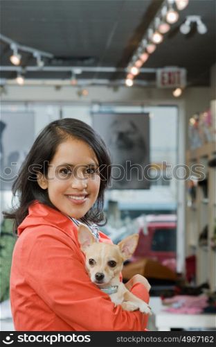 Woman with her pet chihuahua