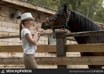 woman with horse stable