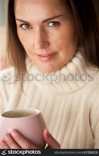Woman with hot drink