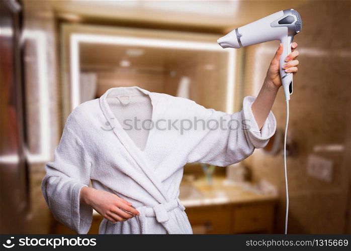 Woman with invisible head dry hair in bathroom. Girl with invisible face in bathrobe hold hairdryer in hands. Invisibility fantasy concept, transparent female person