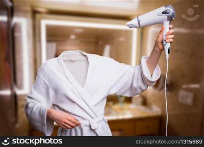 Woman with invisible head dry hair in bathroom. Girl with invisible face in bathrobe hold hairdryer in hands. Invisibility fantasy concept, transparent female person