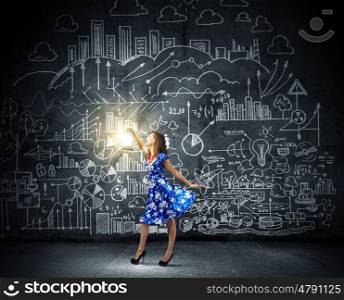 Woman with lantern. Young woman in blue dress with lantern