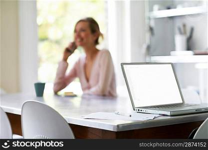 Woman with Laptop at Home