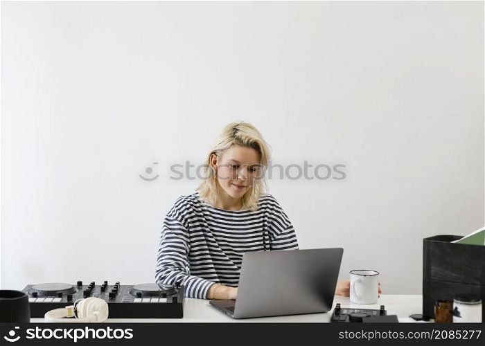 woman with laptop working from home