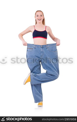 Woman with large jeans in dieting concept